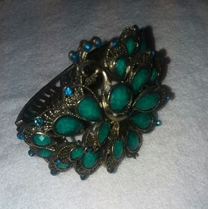 3/$15 Peacock cuff hinged